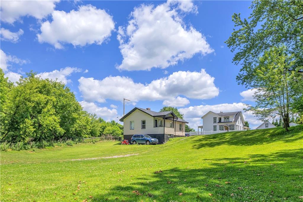 1747 Galilee Road Wampum, PA 16157 - Photo 30 of 32 The property’s nearly one-acre setting offers room to breathe, unwind, and enjoy the outdoors.