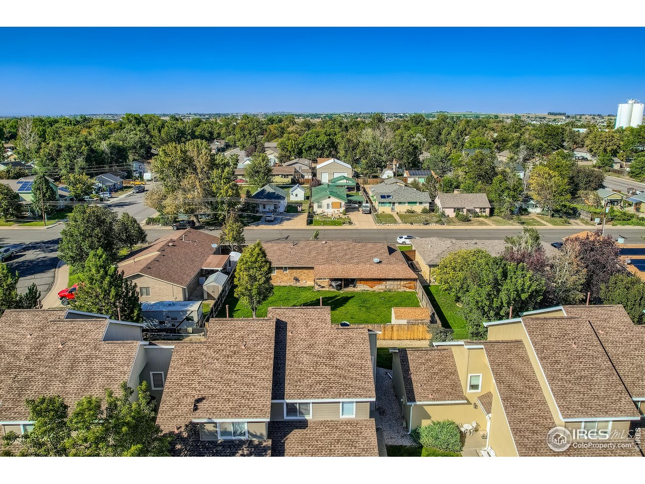 121 Chestnut Street Windsor, CO 80550 - Photo 40 of 42 an aerial view of residential houses with outdoor space and street view