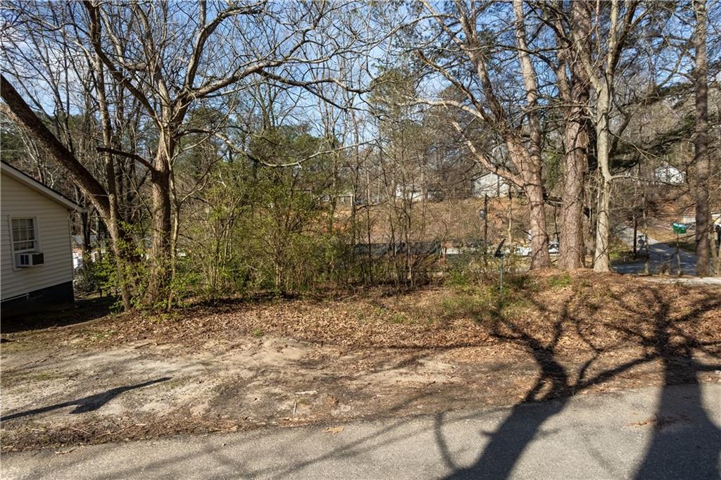 80 Daisy Circle Canton, GA 30114 - Photo 2 of 2 a view of a yard with trees