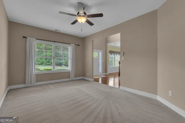 a kitchen with stainless steel appliances granite countertop wooden cabinets a stove top oven a sink and dishwasher