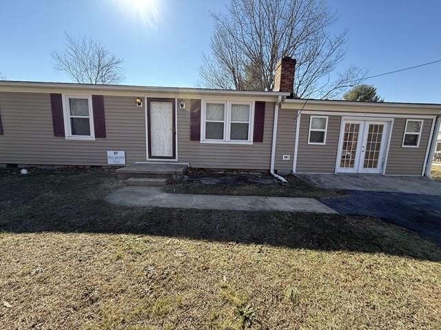 239 Harriston Road Grottoes, VA 24441 - Photo 1 of 20 a front view of a house with a yard
