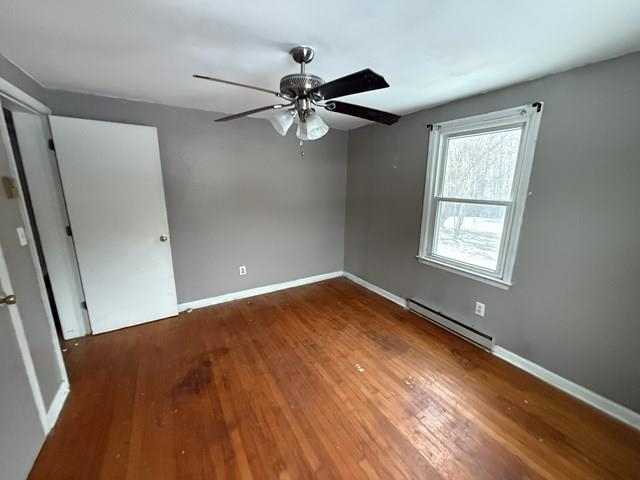 239 Harriston Road Grottoes, VA 24441 - Photo 15 of 20 wooden floor in an empty room with a window