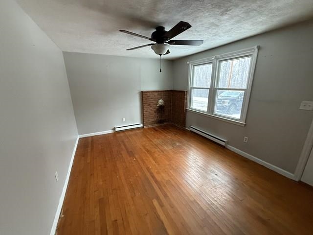 239 Harriston Road Grottoes, VA 24441 - Photo 6 of 20 wooden floor in an empty room with a window