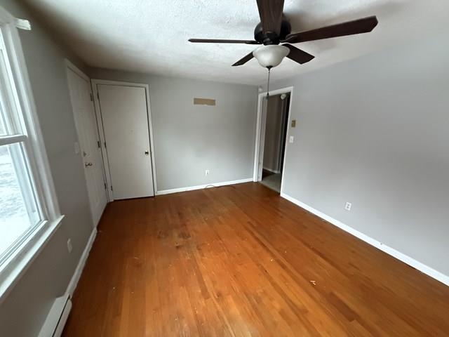 239 Harriston Road Grottoes, VA 24441 - Photo 7 of 20 a view of empty room with wooden floor