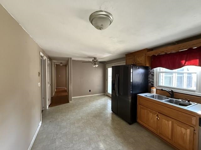 239 Harriston Road Grottoes, VA 24441 - Photo 8 of 20 a kitchen with refrigerator and window