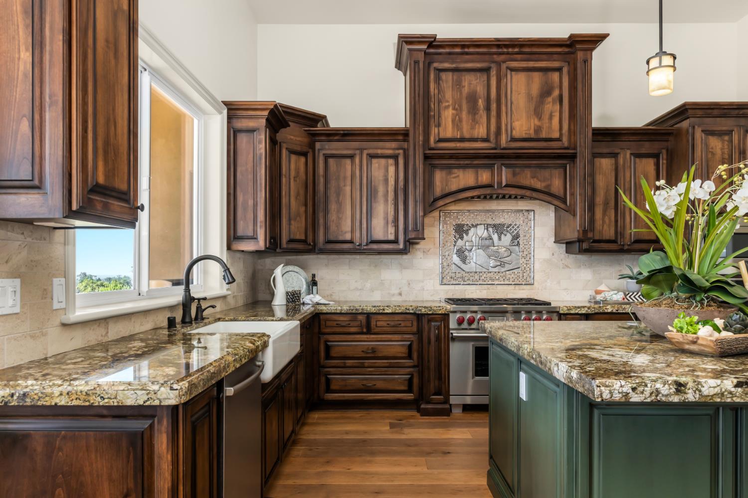 2385 Bald Hill Road Auburn, CA 95603 - Photo 17 of 63 Gorgeous wine theme tile inlay above the stove