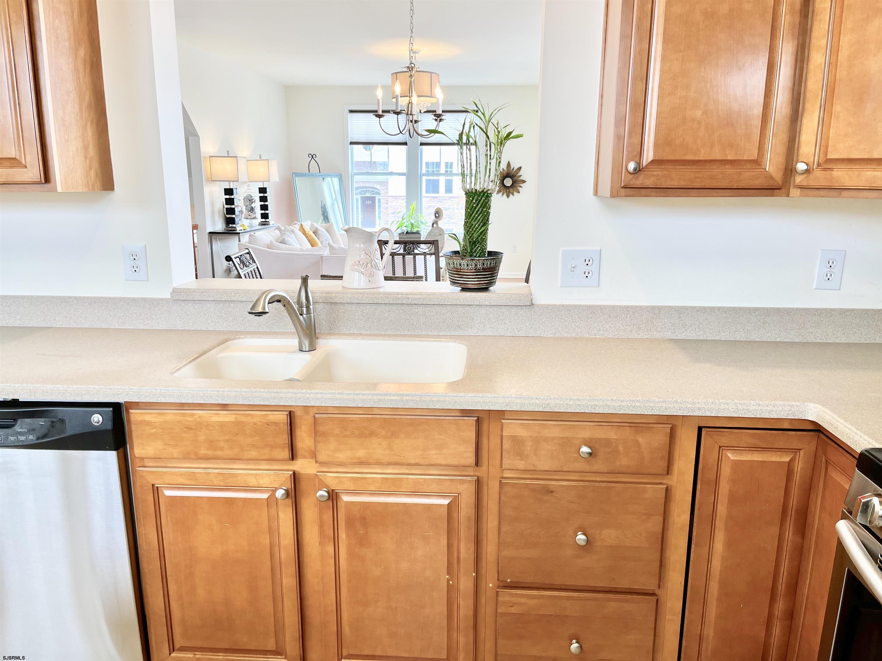 130 Dunlin Lane, Unit 16 Pleasantville, NJ 08232 - Photo 11 of 47 a bathroom with a sink and a mirror