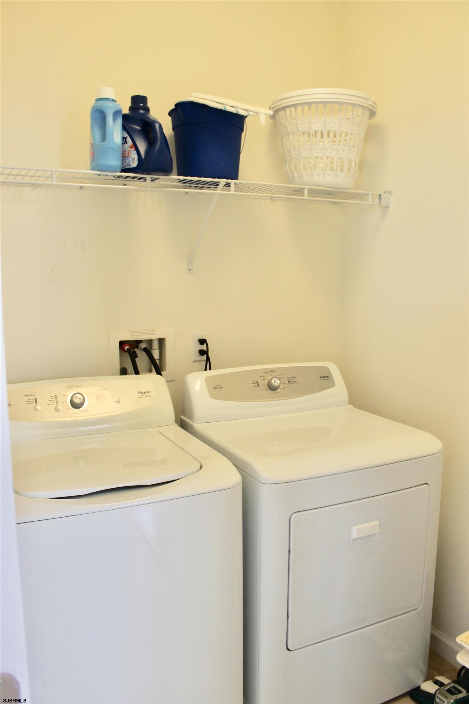 130 Dunlin Lane, Unit 16 Pleasantville, NJ 08232 - Photo 12 of 47 a utility room with dryer and washer