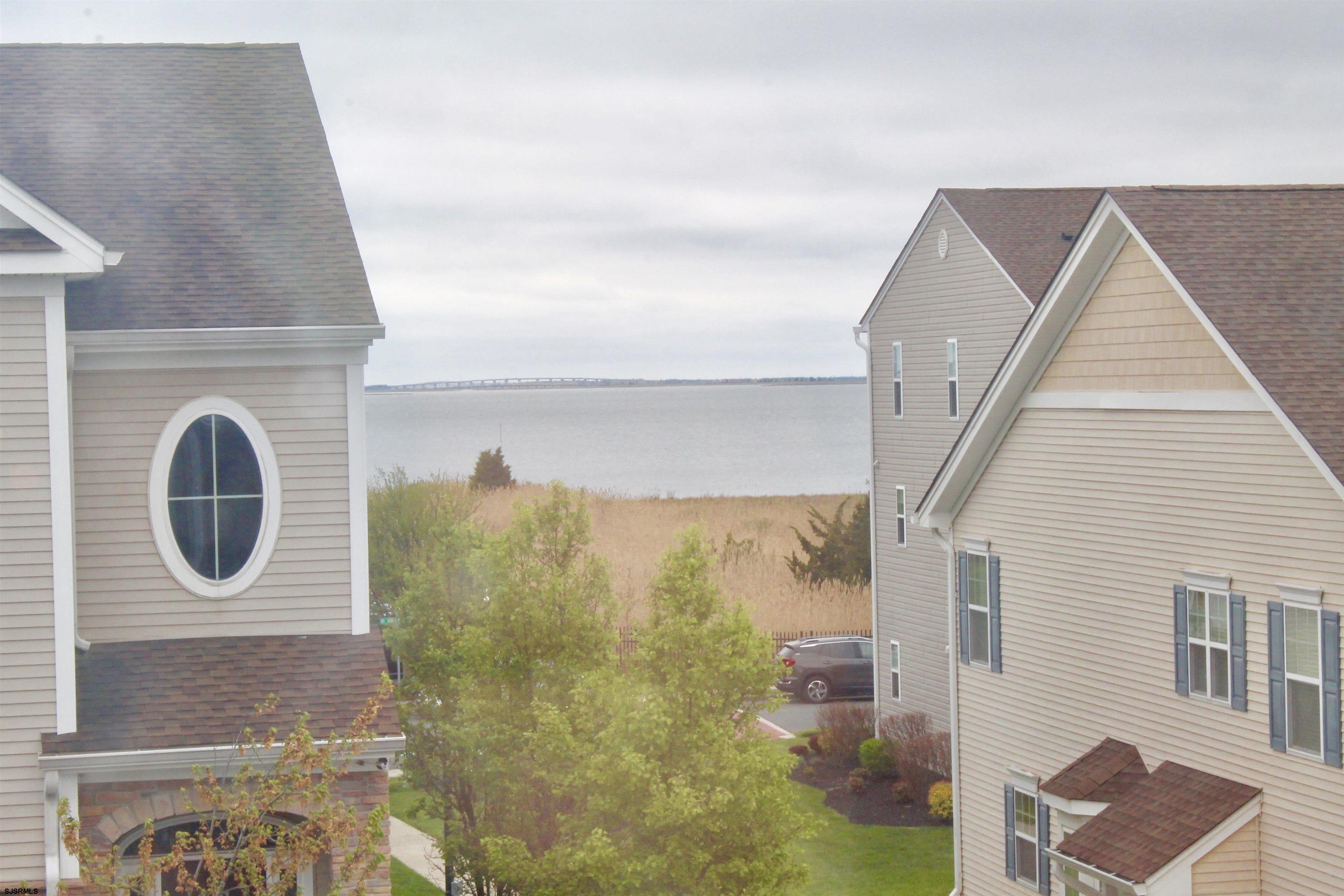 130 Dunlin Lane, Unit 16 Pleasantville, NJ 08232 - Photo 2 of 47 a bathroom with a sink and a mirror
