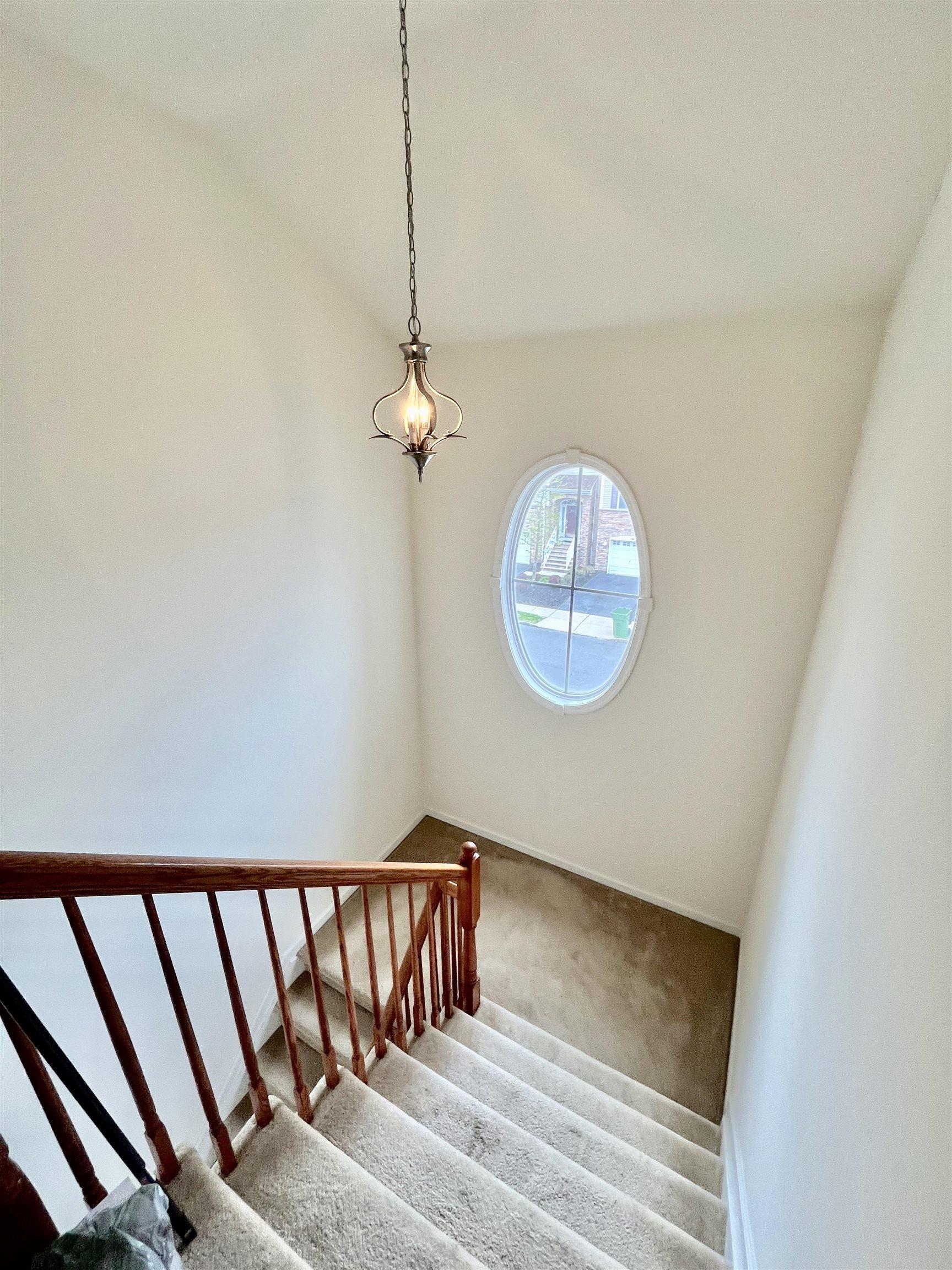 130 Dunlin Lane, Unit 16 Pleasantville, NJ 08232 - Photo 35 of 47 a view of a livingroom with wooden floor and a large window
