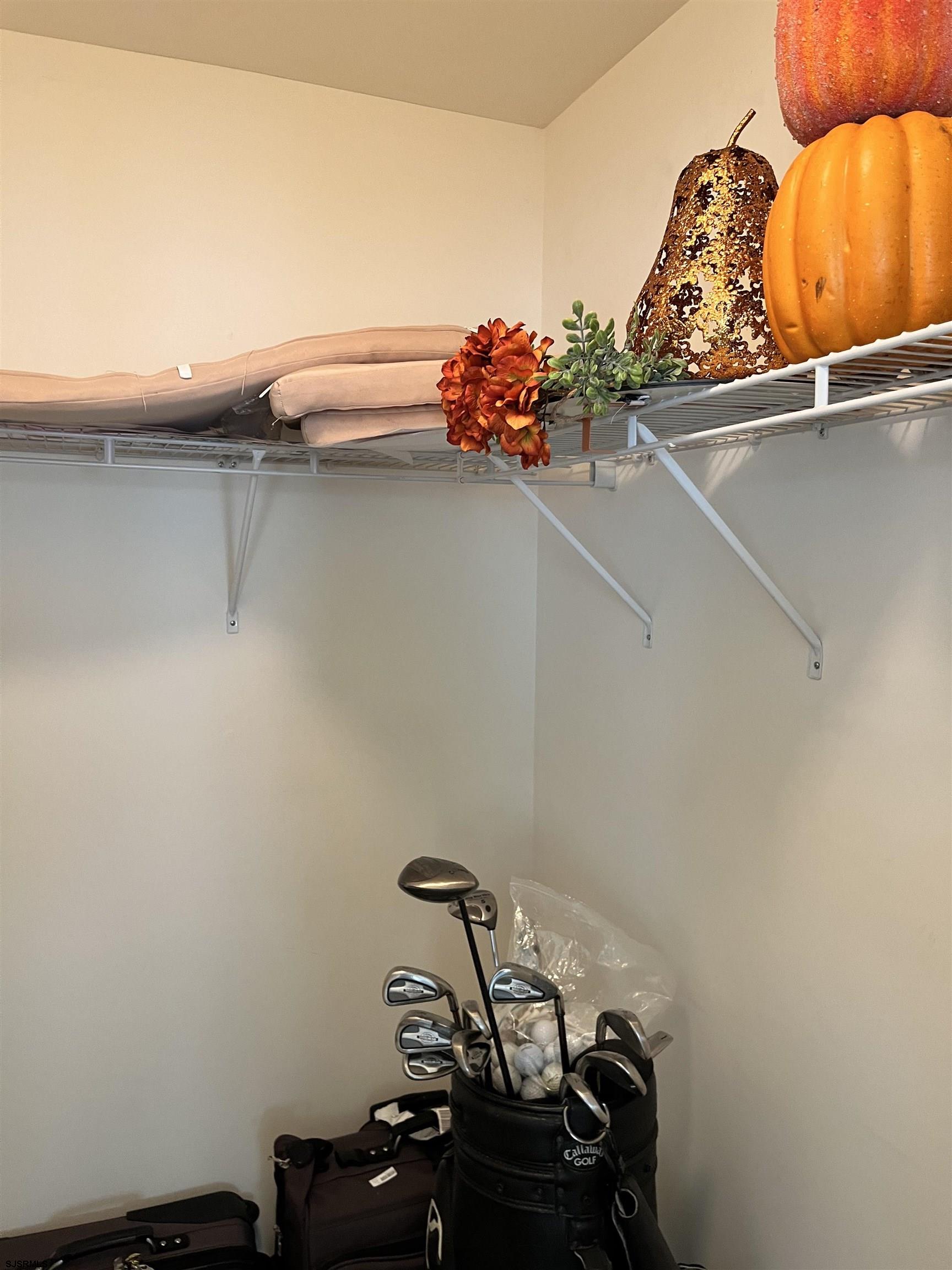 130 Dunlin Lane, Unit 16 Pleasantville, NJ 08232 - Photo 40 of 47 a view of a room with rack on the wall