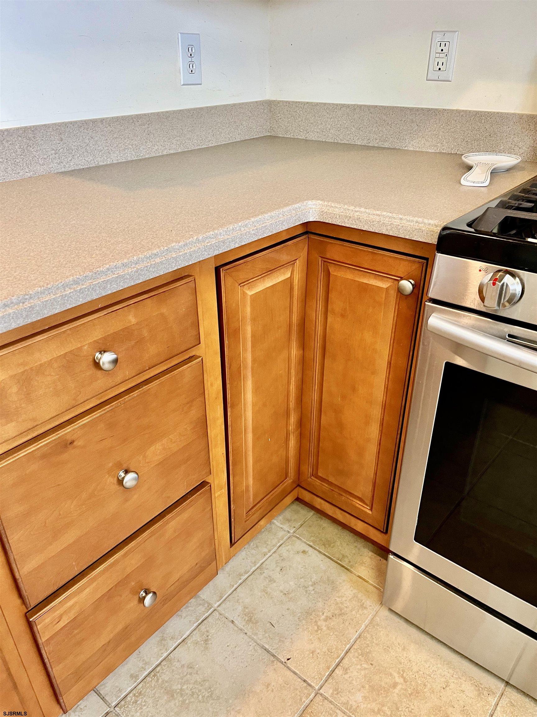130 Dunlin Lane, Unit 16 Pleasantville, NJ 08232 - Photo 9 of 47 a bathroom with a sink and washing machine