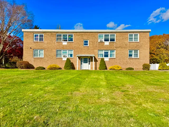 a front view of house with yard