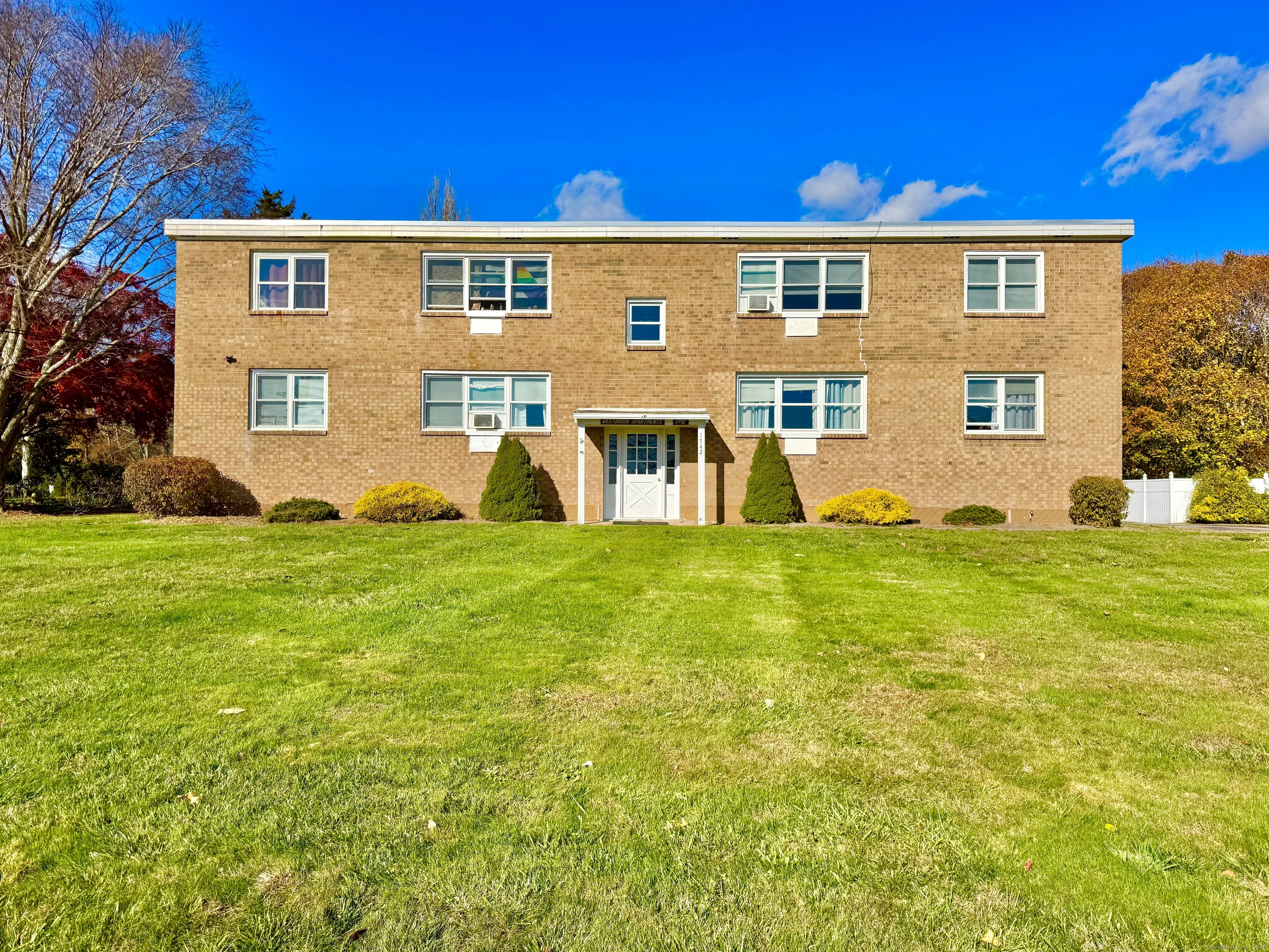 a front view of house with yard