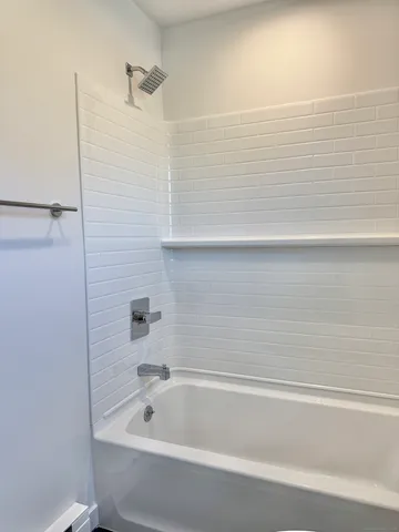 a bathroom with a bathtub