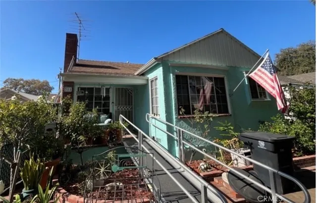 a front view of house along with street