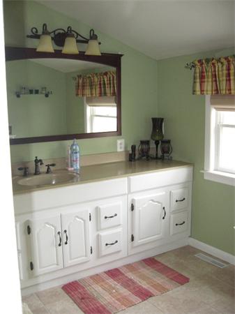 74 Aspen Road Springfield, MA 01128 - Photo 16 of 26 a bathroom with a sink and a window