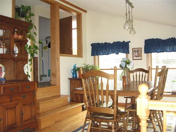 74 Aspen Road Springfield, MA 01128 - Photo 10 of 26 a view of a dining room with furniture and wooden floor