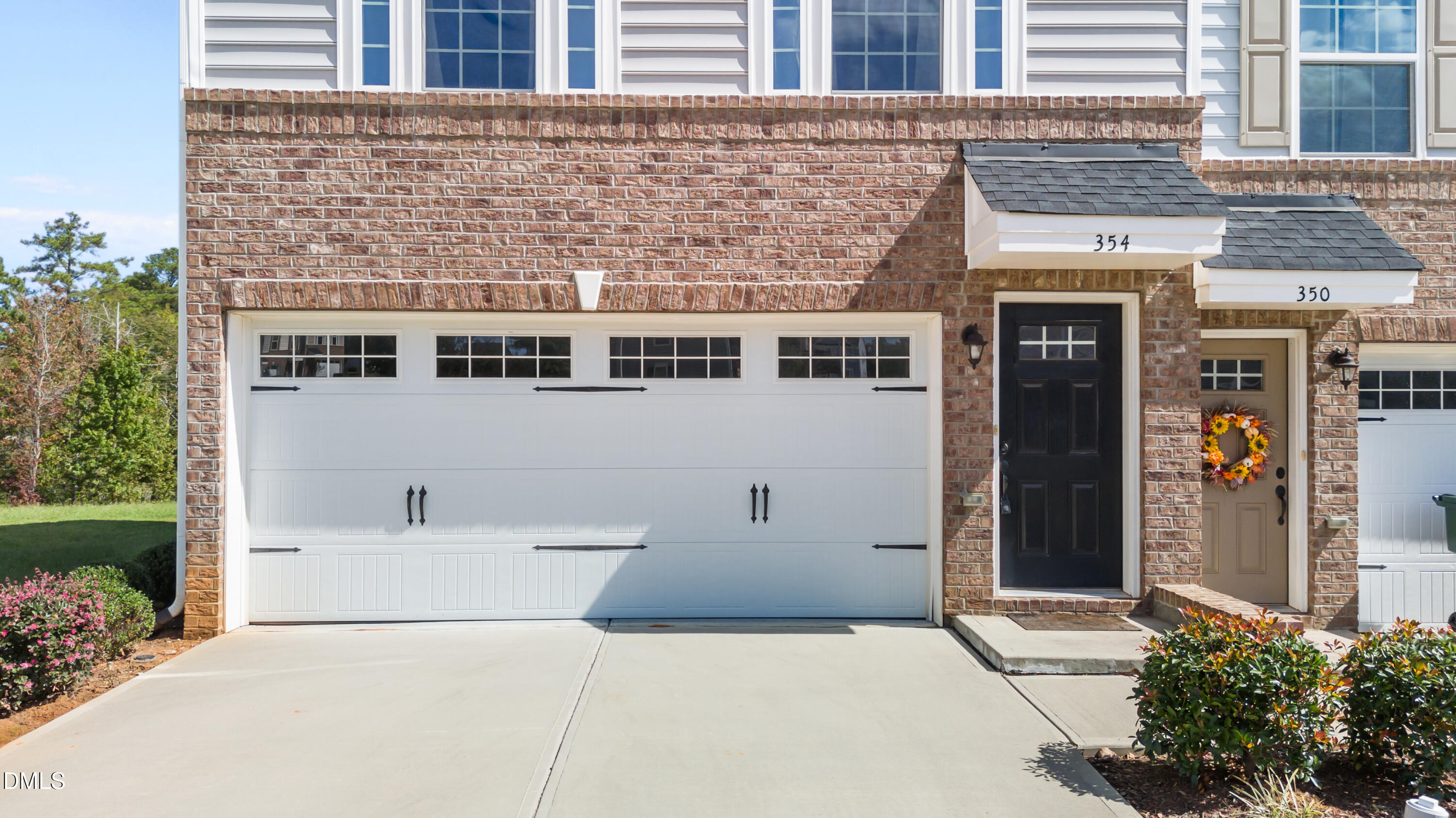 354 Amber Acorn Avenue Raleigh, NC 27603 - Photo 12 of 47 a view of a building with a outdoor space