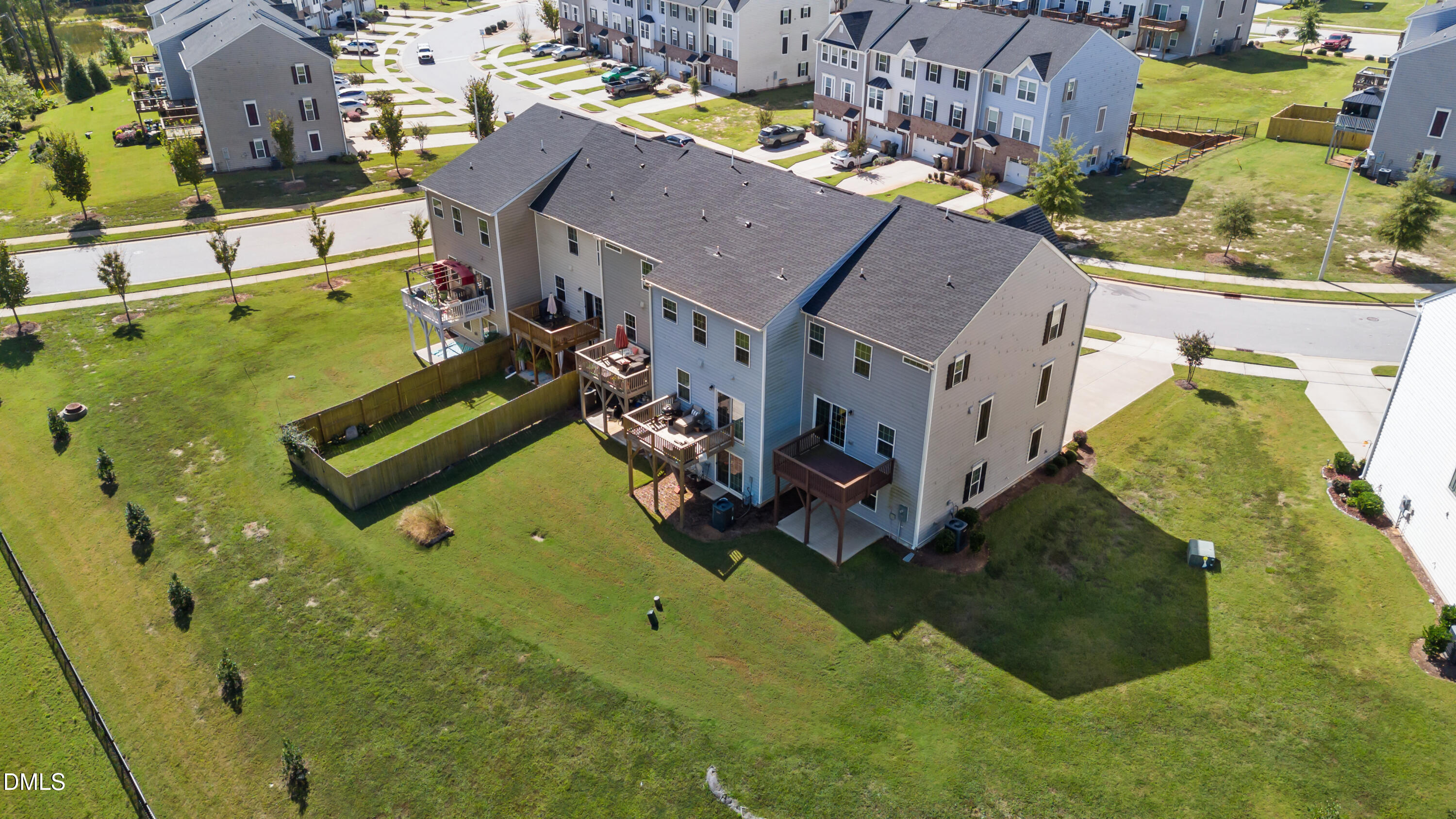 354 Amber Acorn Avenue Raleigh, NC 27603 - Photo 16 of 47 an aerial view of a house with a swimming pool