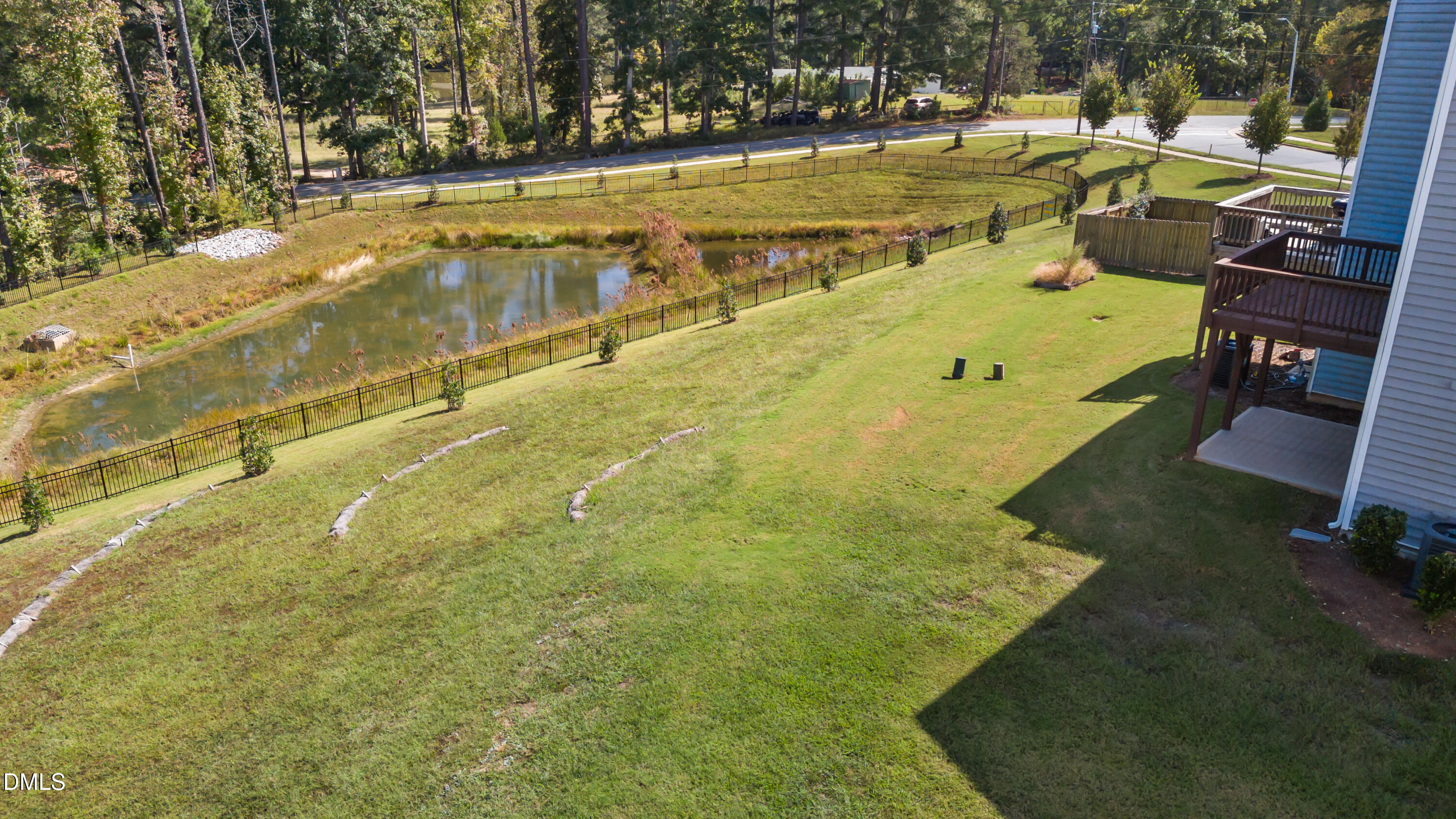 354 Amber Acorn Avenue Raleigh, NC 27603 - Photo 19 of 47 a view of an outdoor space and swimming pool