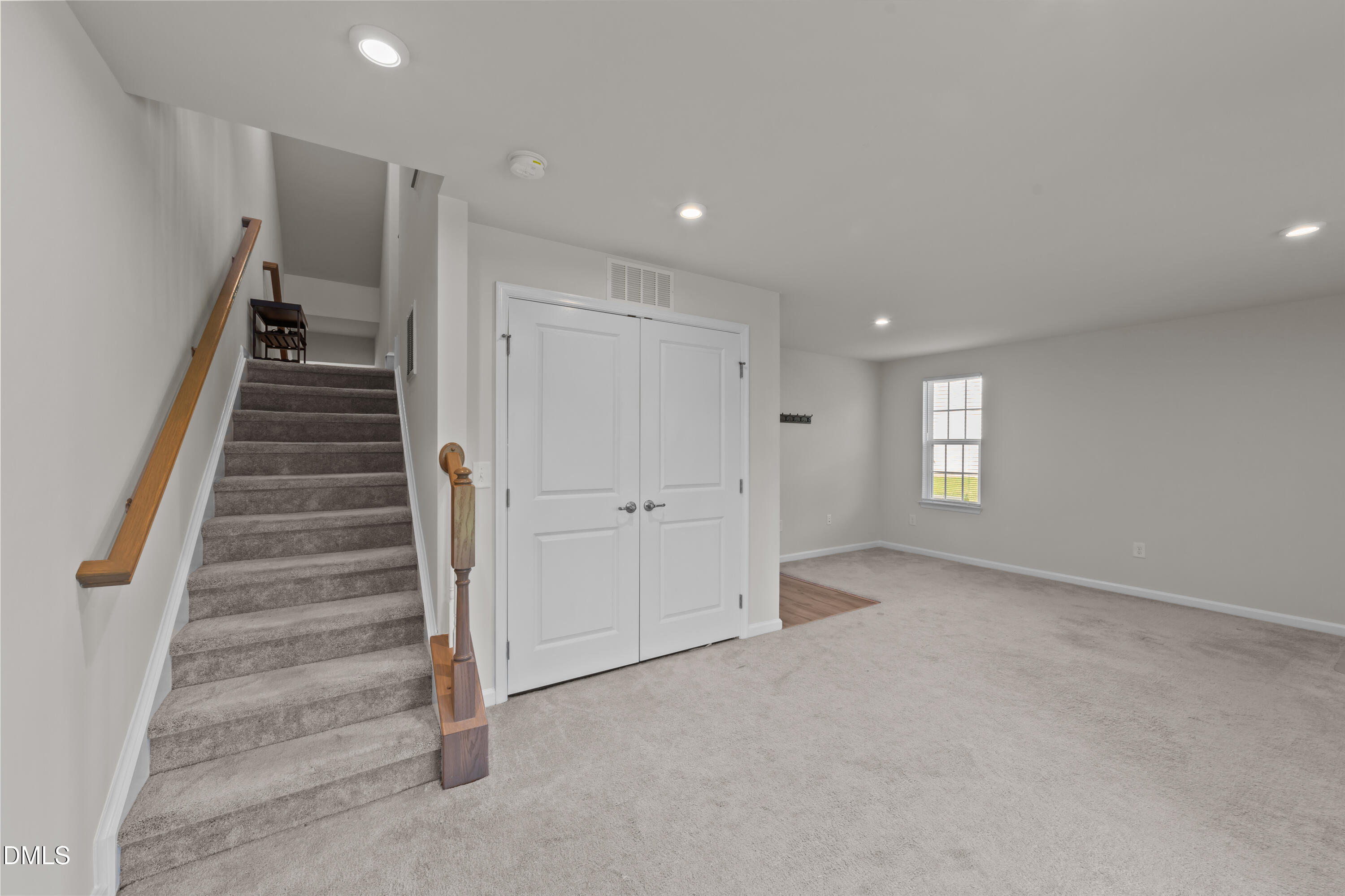354 Amber Acorn Avenue Raleigh, NC 27603 - Photo 20 of 47 a view of an entryway with stairs