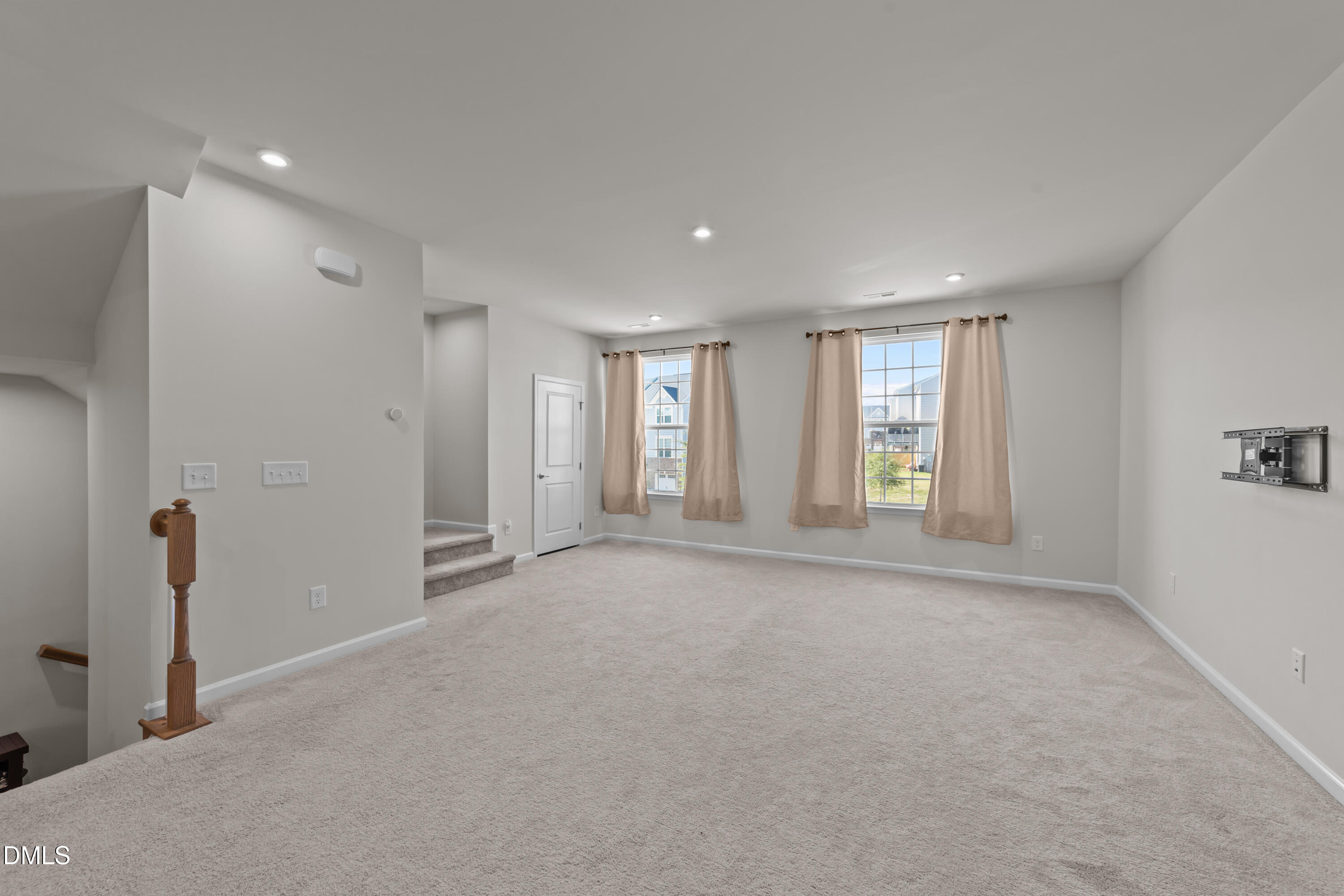 354 Amber Acorn Avenue Raleigh, NC 27603 - Photo 25 of 47 a view of an empty room with a window