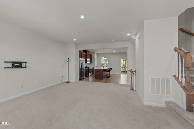 a view of a livingroom with a flat screen tv
