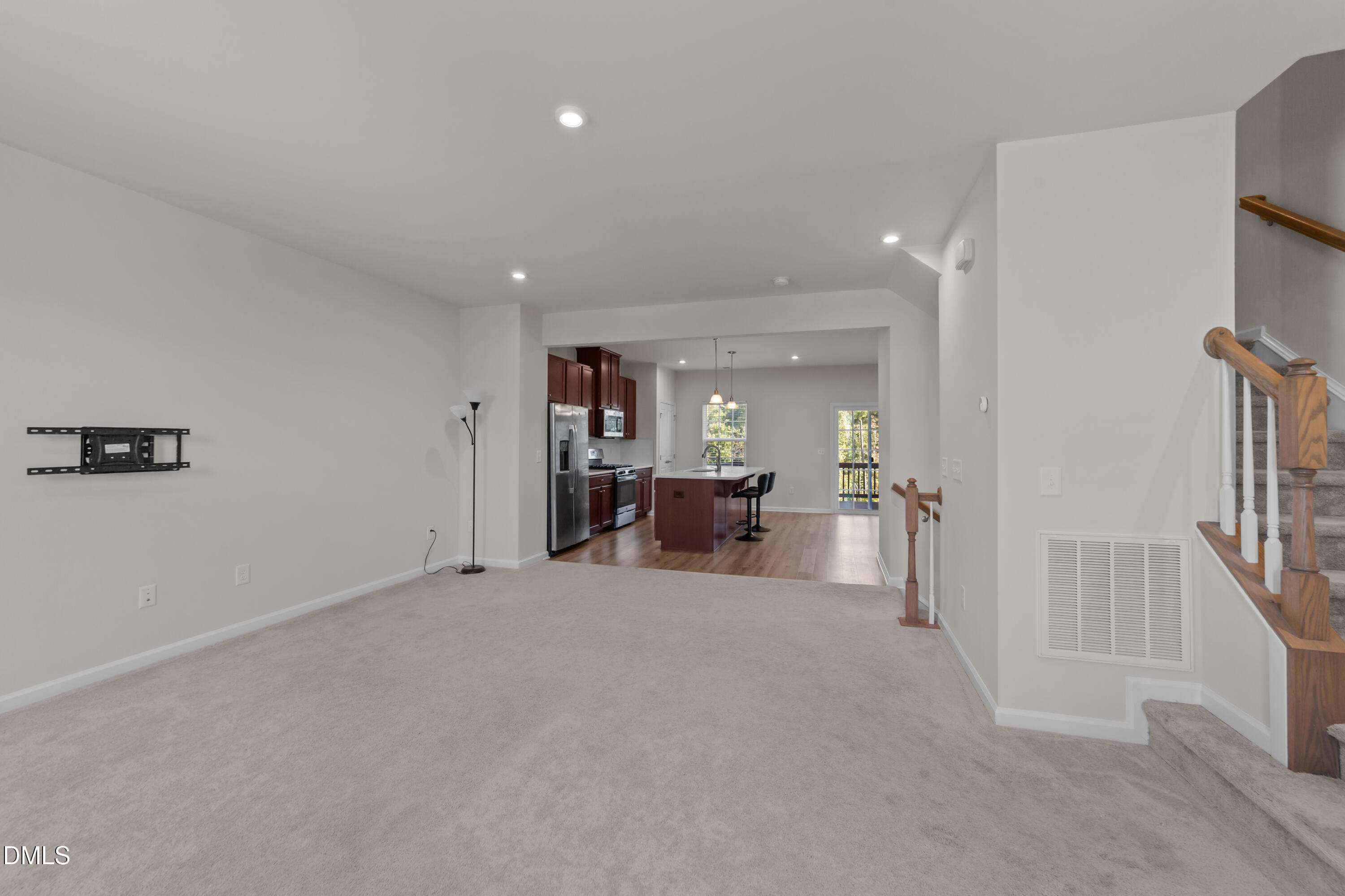 354 Amber Acorn Avenue Raleigh, NC 27603 - Photo 26 of 47 a view of a livingroom with a flat screen tv