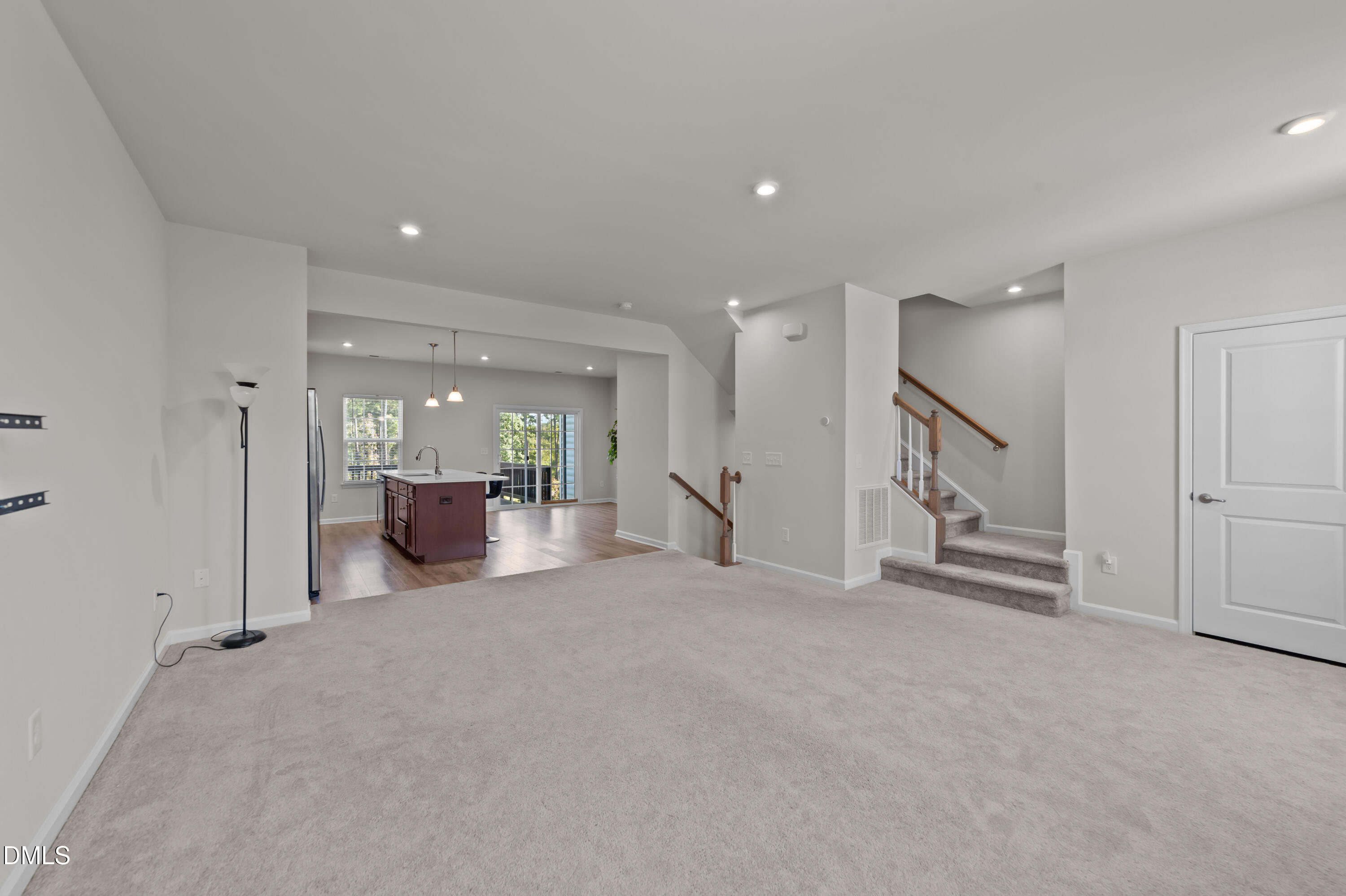 354 Amber Acorn Avenue Raleigh, NC 27603 - Photo 27 of 47 a view of a livingroom with furniture and a hallway