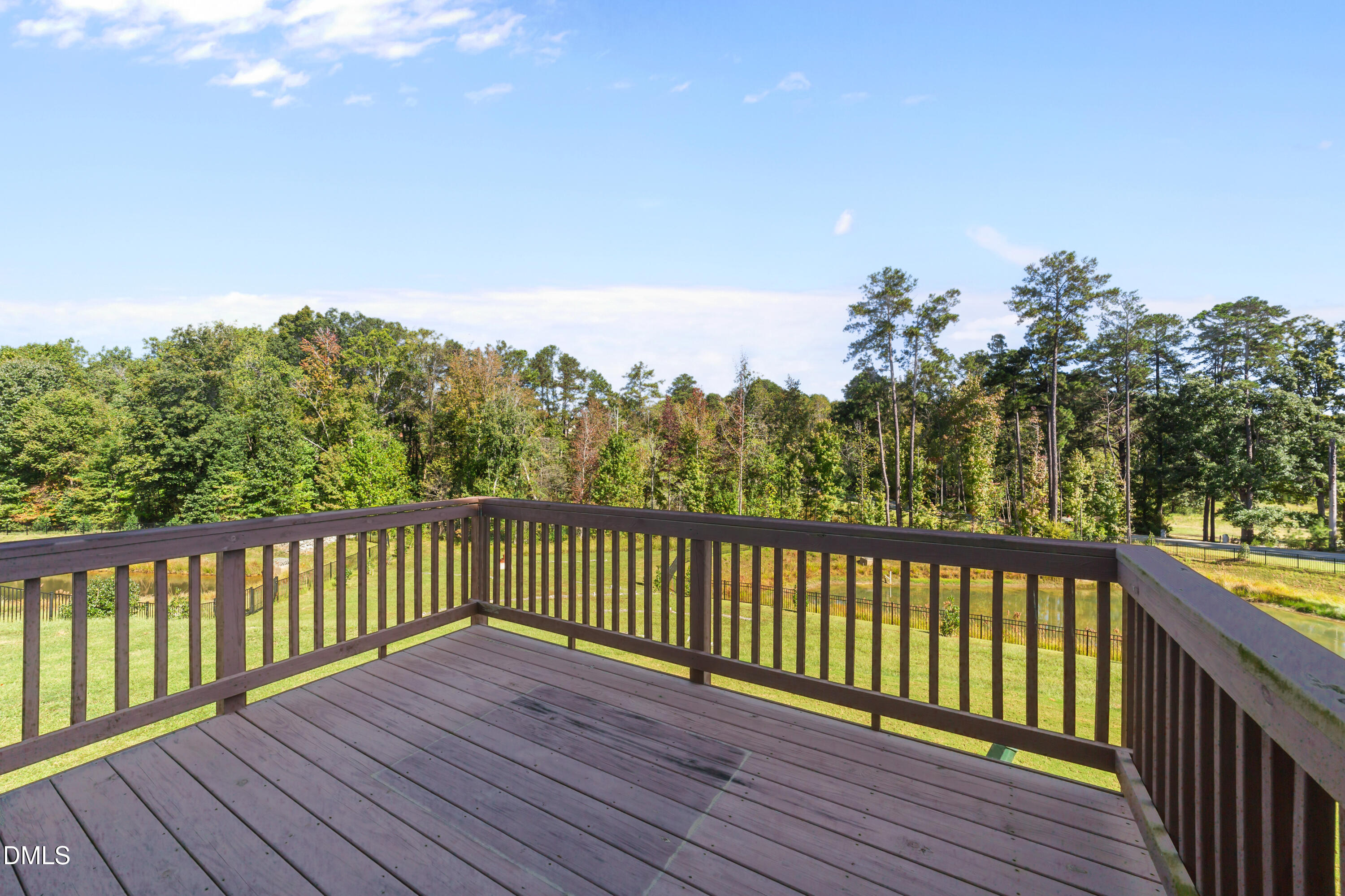 354 Amber Acorn Avenue Raleigh, NC 27603 - Photo 30 of 47 a view of a balcony with wooden floor