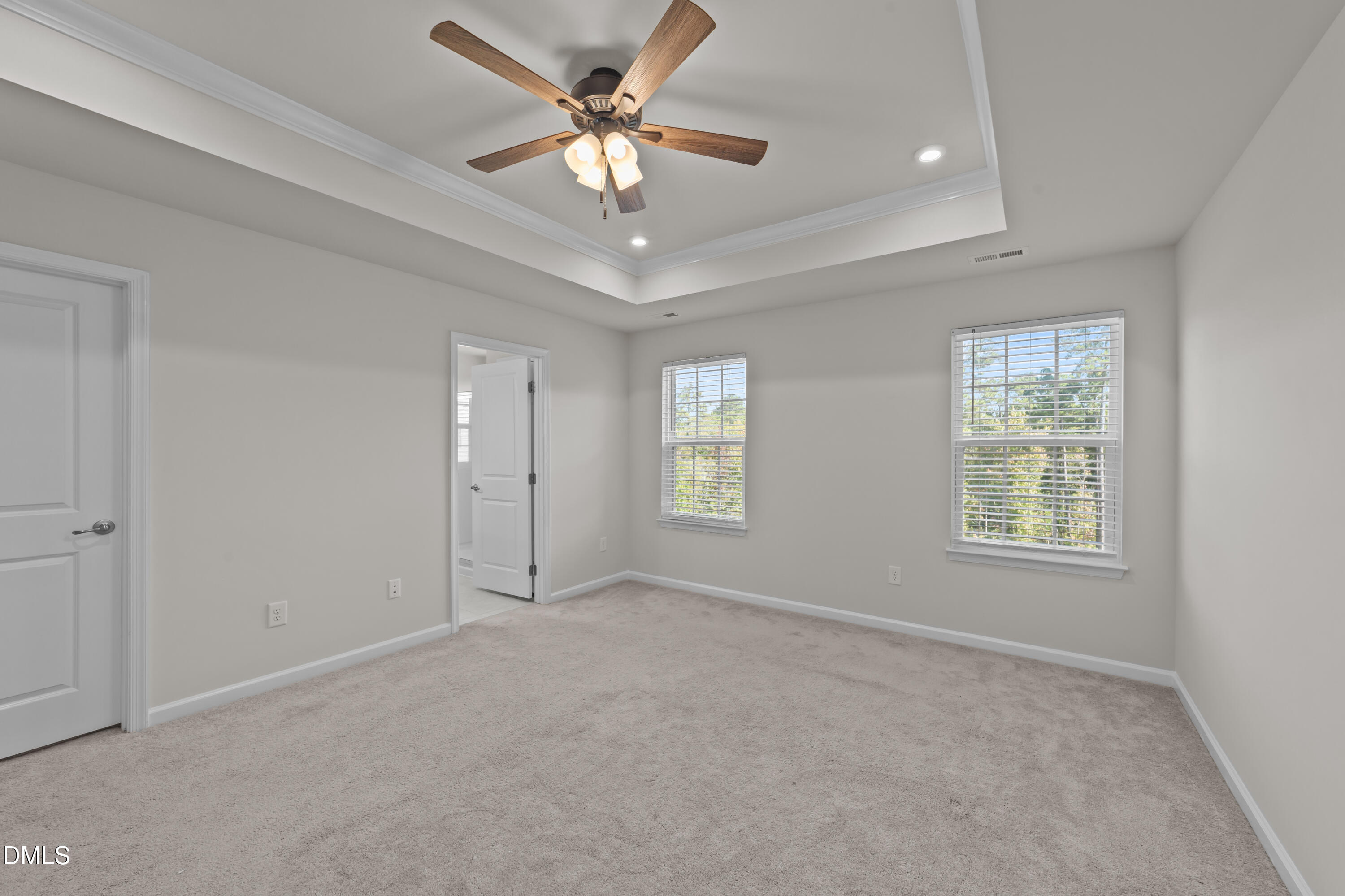 354 Amber Acorn Avenue Raleigh, NC 27603 - Photo 34 of 47 a view of an empty room with a window