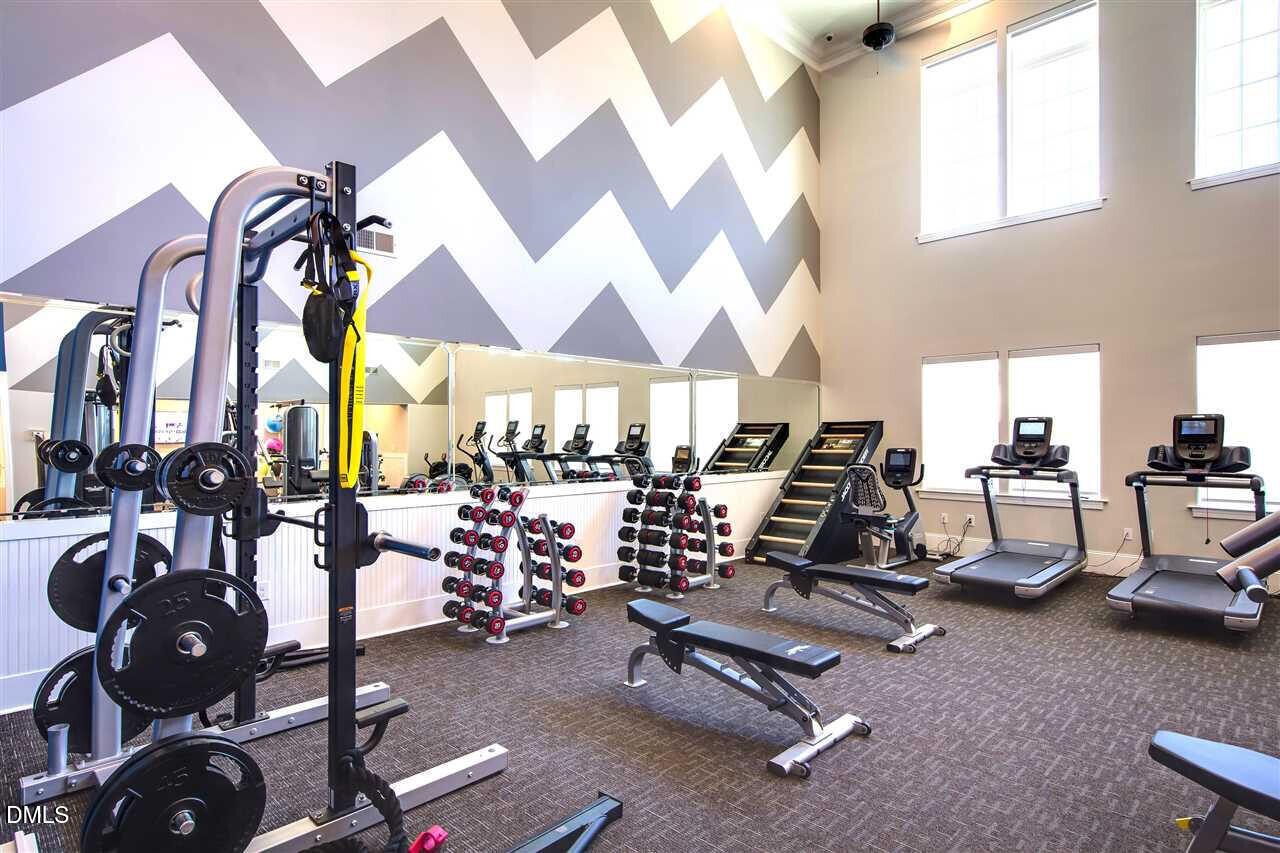 354 Amber Acorn Avenue Raleigh, NC 27603 - Photo 38 of 47 a view of a room with gym equipment