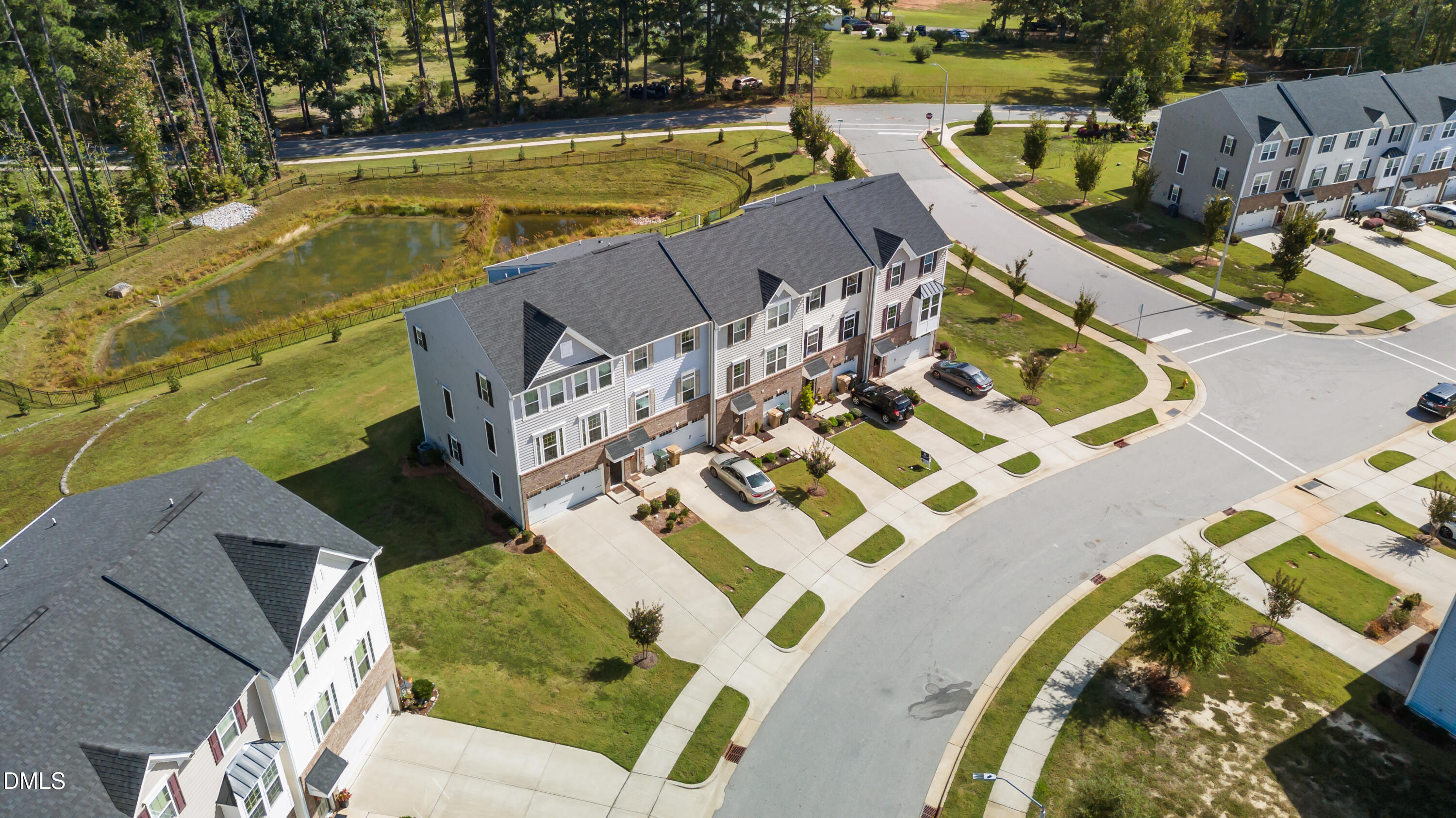 354 Amber Acorn Avenue Raleigh, NC 27603 - Photo 4 of 47 an aerial view of a house with a ocean view