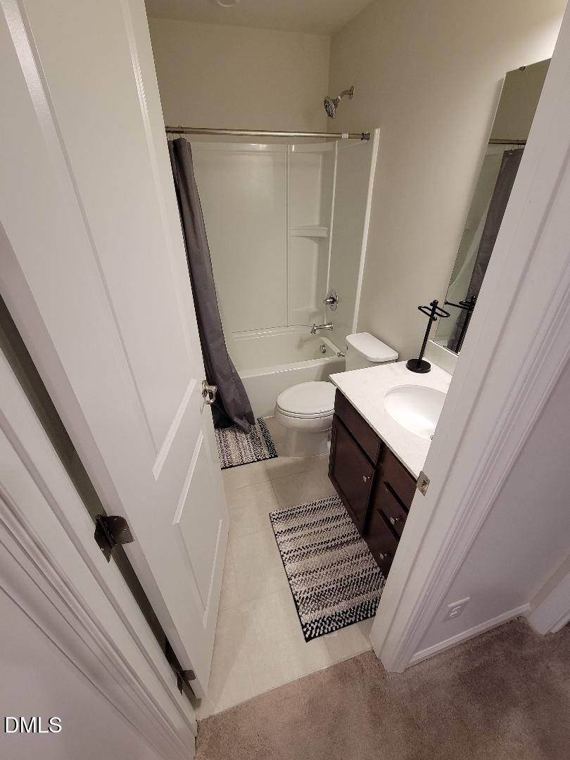 354 Amber Acorn Avenue Raleigh, NC 27603 - Photo 47 of 47 a bathroom with a sink a toilet a toilet and a window