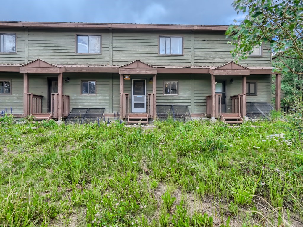 52 Club House Road, Unit 56 Breckenridge, CO 80424 - Photo 24 of 25 a front view of a house with garden