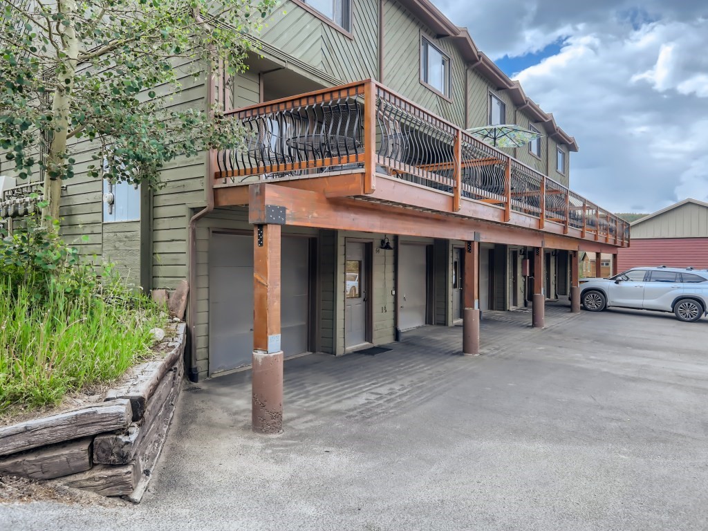 52 Club House Road, Unit 56 Breckenridge, CO 80424 - Photo 25 of 25 a front view of a house with parking
