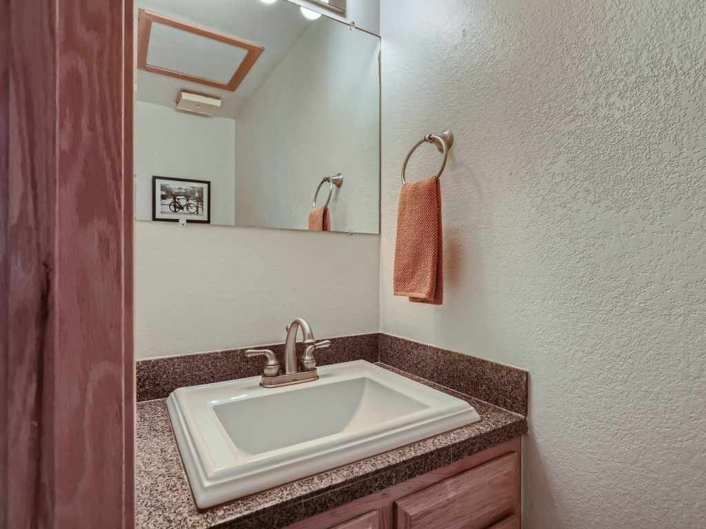 52 Club House Road, Unit 56 Breckenridge, CO 80424 - Photo 8 of 25 a bathroom with a sink and a mirror