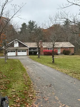 a house view with a garden space