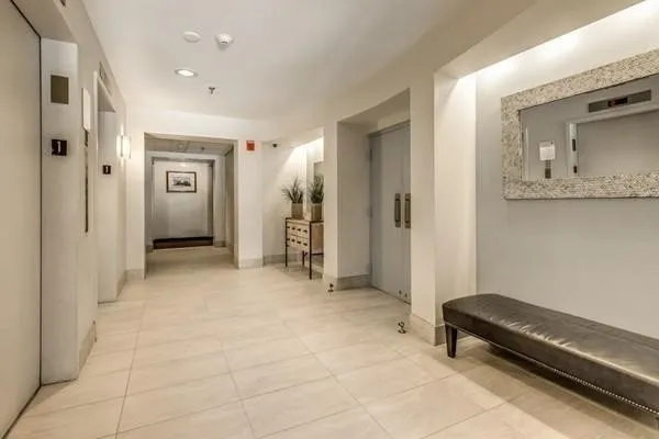 a view of a hallway with closet area