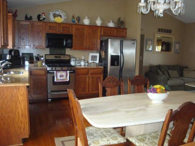 12137 Sullivan Road Emmett, MI 48022 - Photo 3 of 26 This view is looking from dining area into the kitchen.