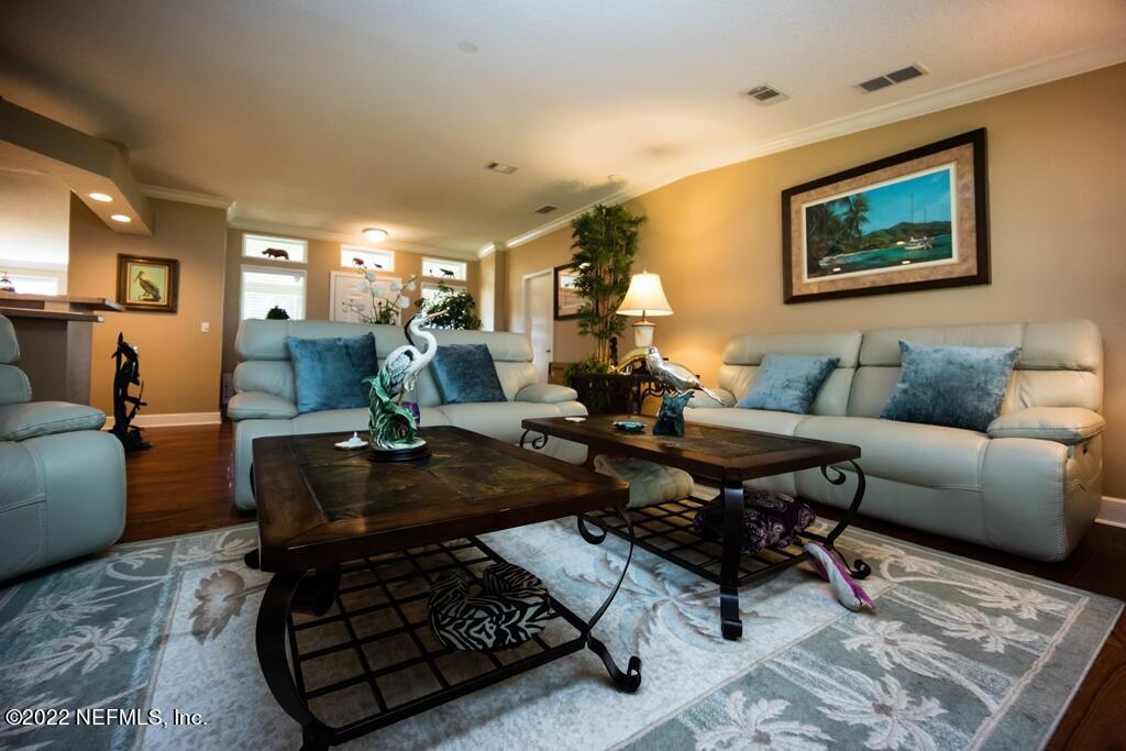 105 South Lake George Drive Georgetown, FL 32139 - Photo 14 of 71 a living room with furniture and wooden floor
