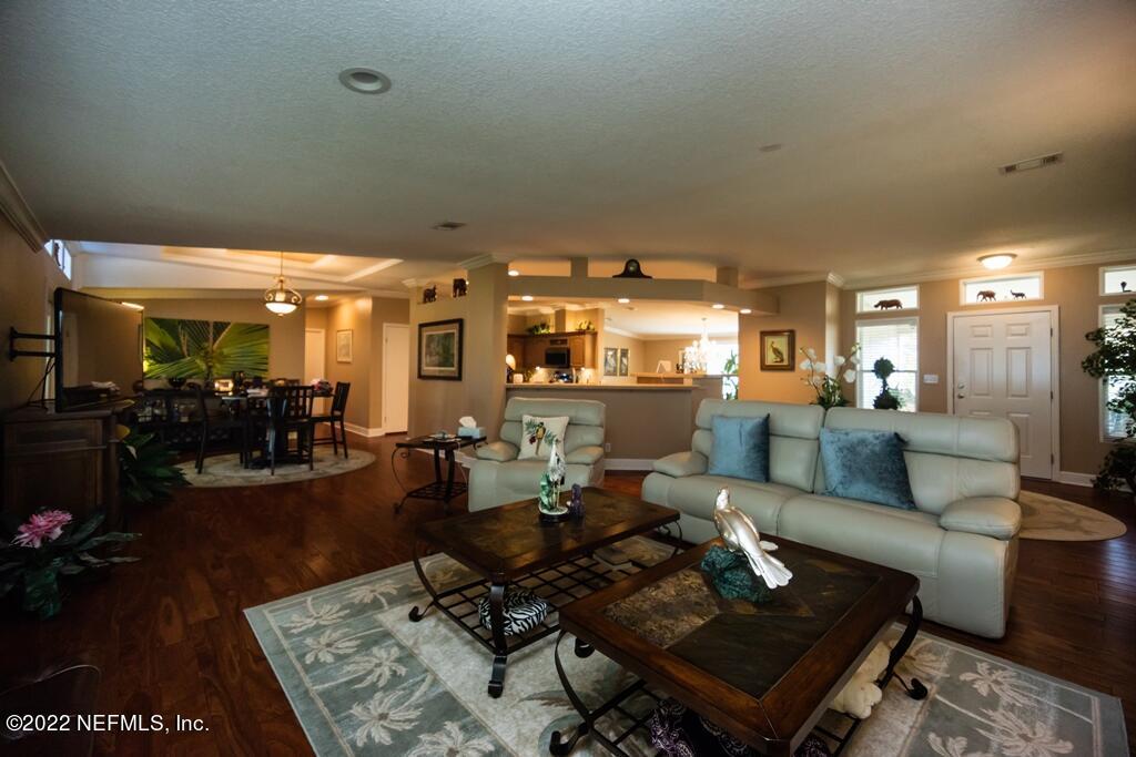 105 South Lake George Drive Georgetown, FL 32139 - Photo 15 of 71 a living room with furniture and a table