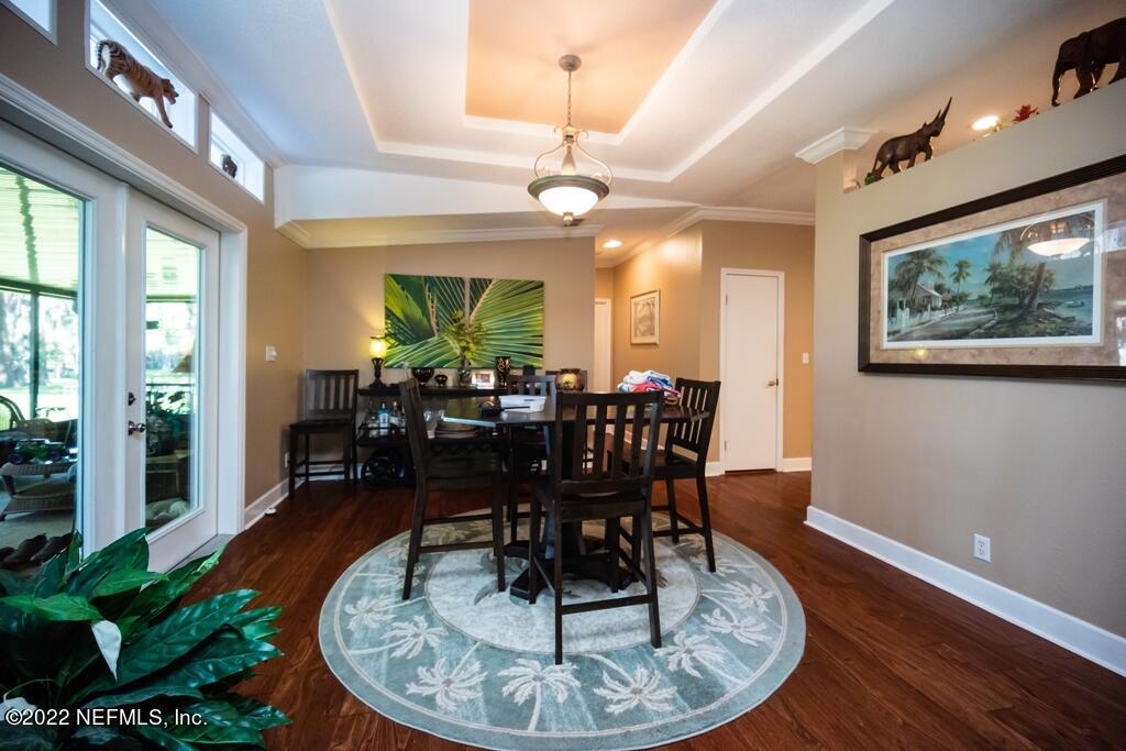 105 South Lake George Drive Georgetown, FL 32139 - Photo 25 of 71 a view of a dining room with furniture window and wooden floor