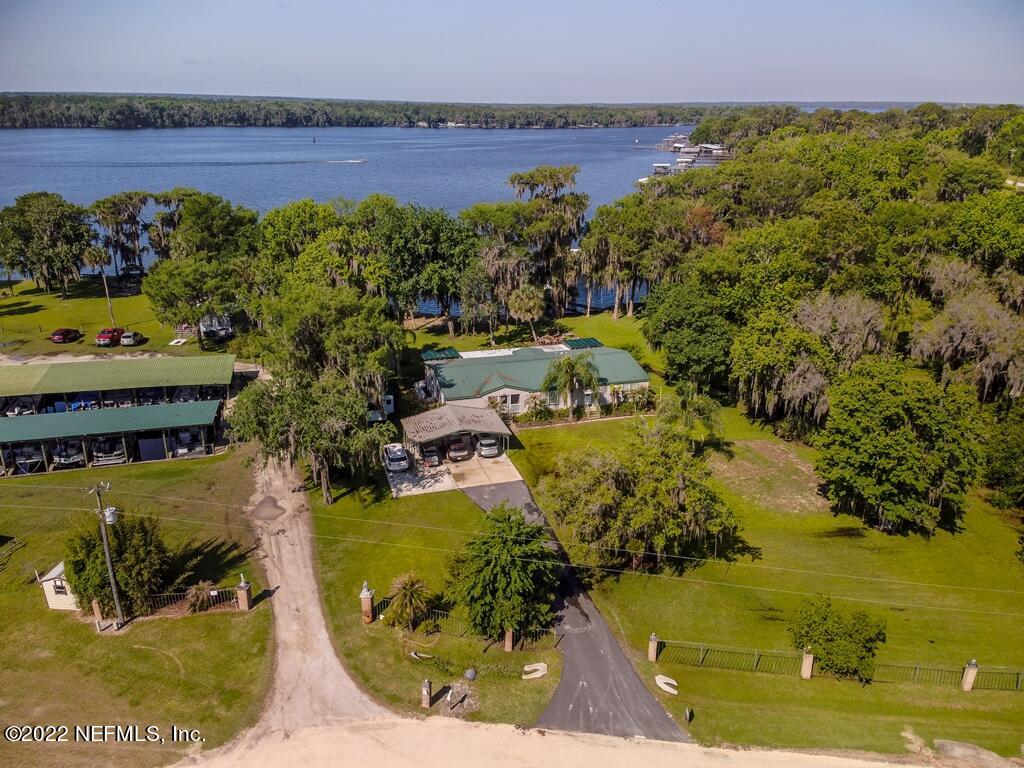 105 South Lake George Drive Georgetown, FL 32139 - Photo 3 of 71 an aerial view of a house with a garden