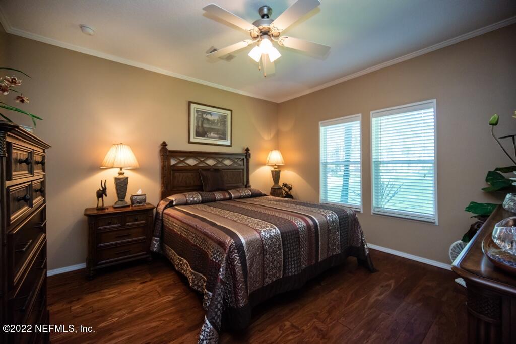 105 South Lake George Drive Georgetown, FL 32139 - Photo 36 of 71 a bedroom with a bed and a window with the outer view
