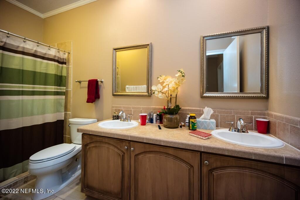 105 South Lake George Drive Georgetown, FL 32139 - Photo 41 of 71 a bathroom with a sink and a toilet