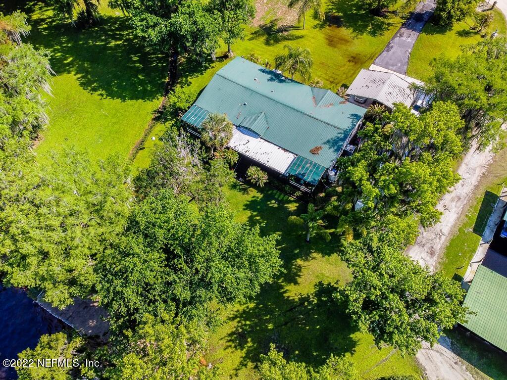 105 South Lake George Drive Georgetown, FL 32139 - Photo 67 of 71 an aerial view of residential house with an outdoor space and seating