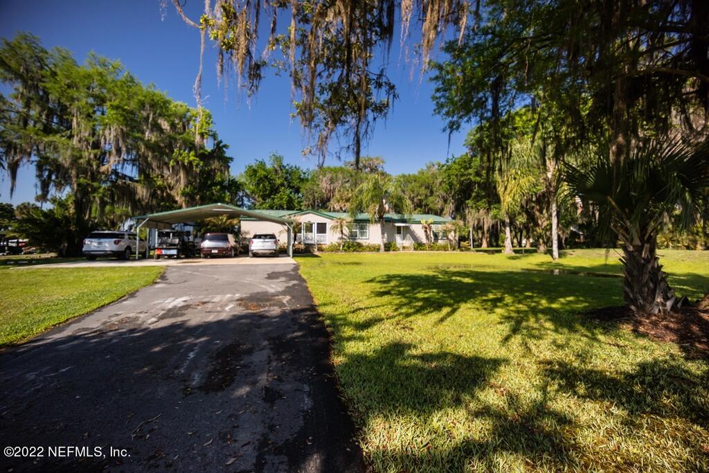 105 South Lake George Drive Georgetown, FL 32139 - Photo 7 of 71 a view of a park with large trees