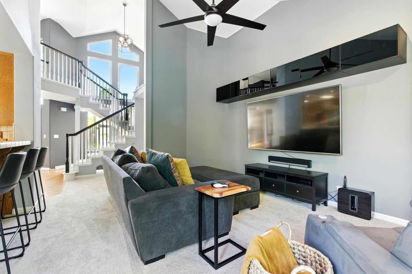 735 Georgetown Place Gilroy, CA 95020 - Photo 12 of 48 a living room with furniture and a flat screen tv